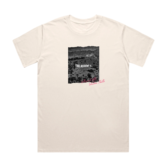 Beige t-shirt with a black and white graphic and text on a white background