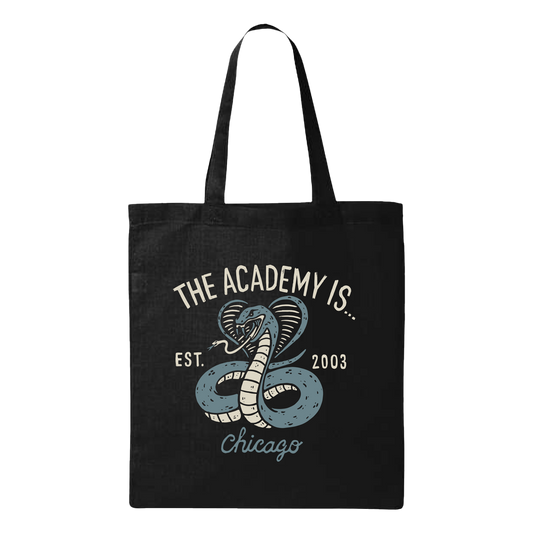 Black tote bag with snake design and text on a white background